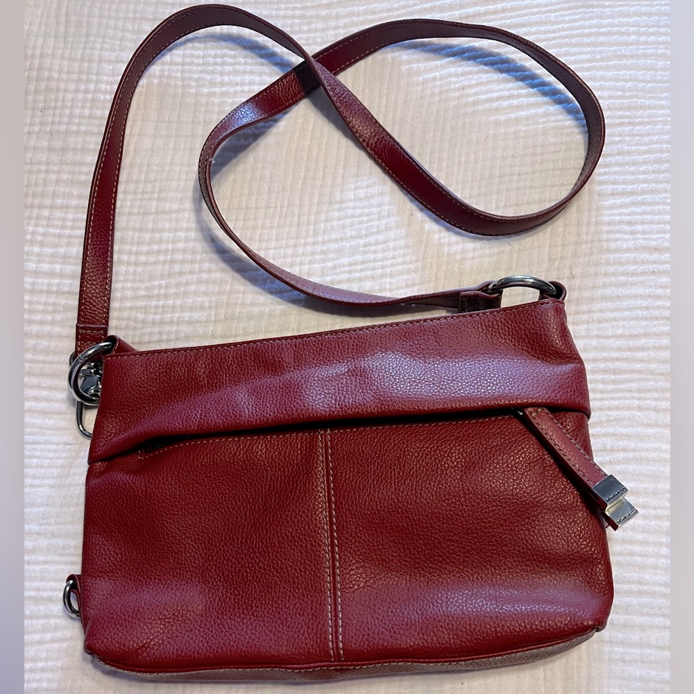 Deep red leather like new purse.